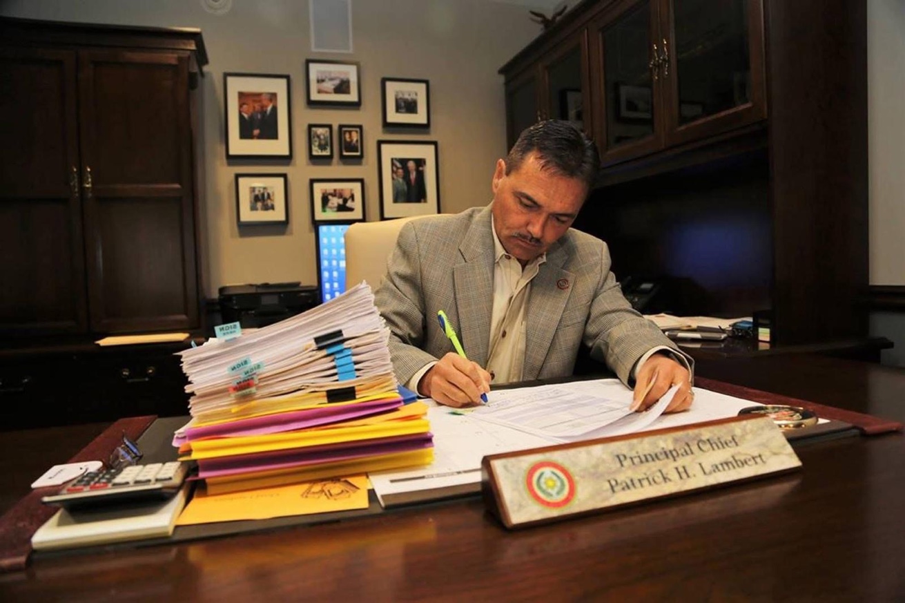 Principal Chief Lambert at work in the Chief's office