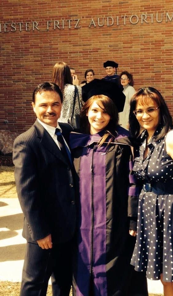Patrick, Gina, and Cyndi at Gina's law school graduation, Chester Fritz Auditorium, UND