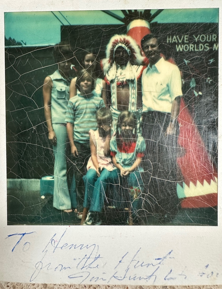 Jim Hunt's family posing with Henry Lambert at his roadside stand — years before the gaming compact
