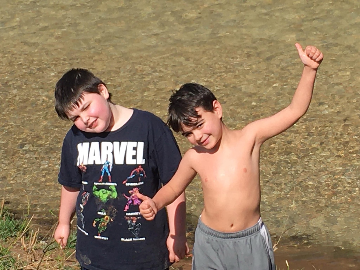 John Henry and Bear by the river in Oklahoma