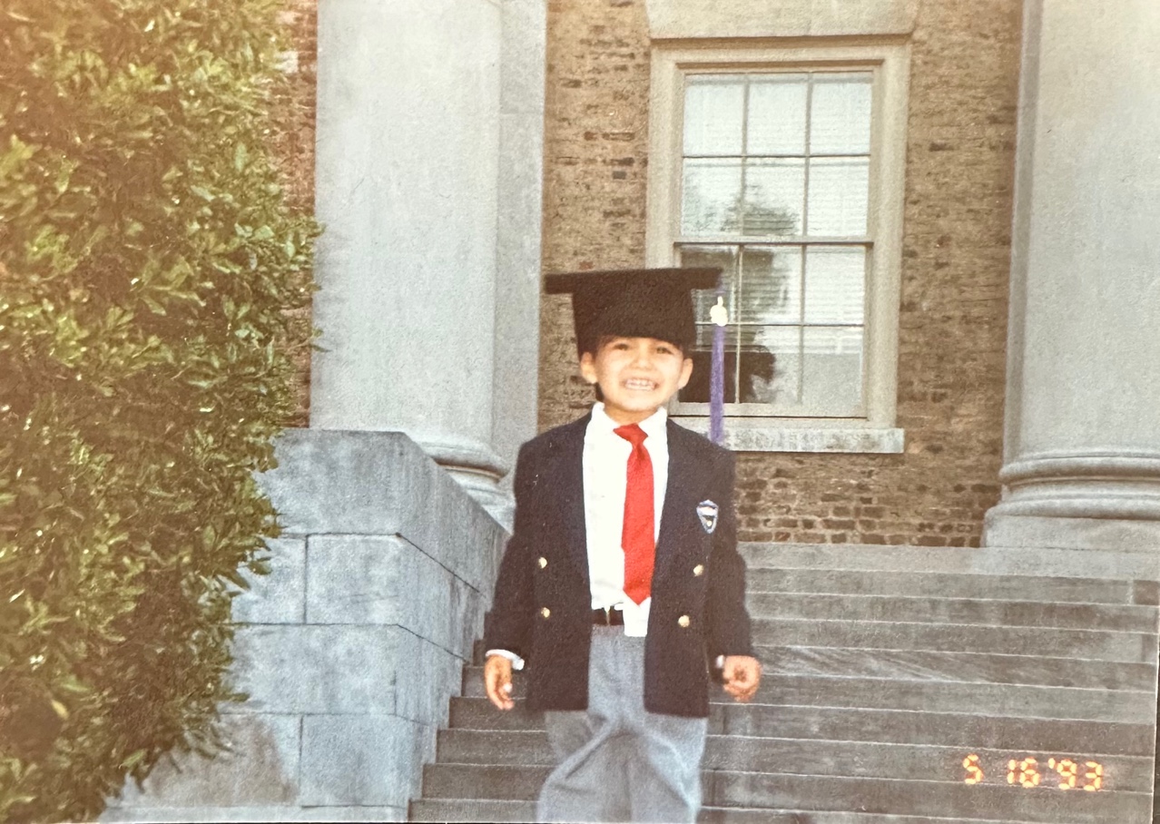 Young Nelson Lambert in his father's graduation cap, UNC, 1993