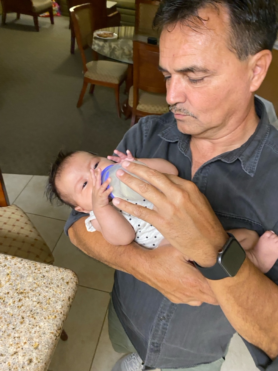 PopPop bottle-feeding baby Ava